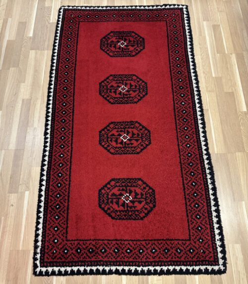 Moderner Afghan-Teppich in Rot und Schwarz – Wollteppich mit Elefantenfuss-Motiv, 198 x 106 cm