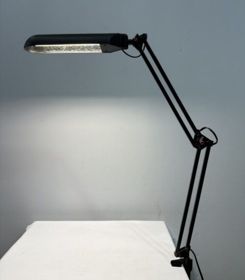 Schwarze Schreibtischlampe mit Federarm und Tischklemme