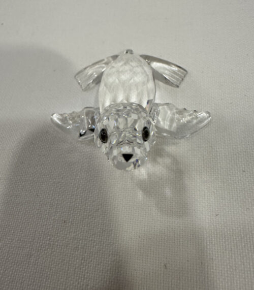 Kristall Sehundfigur aus Glas mit facettiertem Schliff und schwarzen Augen