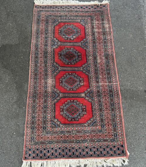 Orientteppich mit roten Achteck Medaillons 184 x 91 cm