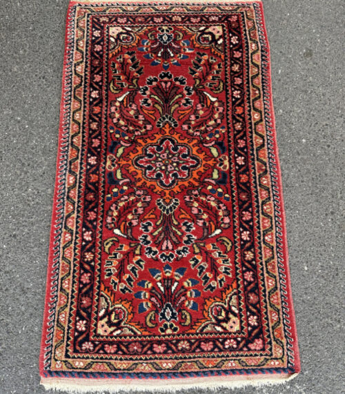 Orientteppich mit floralem Medaillonmuster 119 x 66 cm