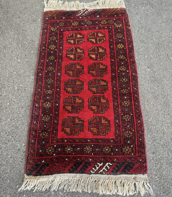 Orientteppich handgeknüpft mit geometrischem Muster 113 x 56 cm