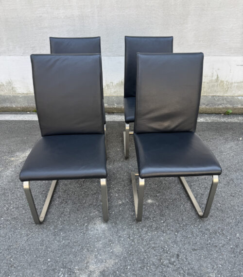 4er-Set Freischwinger Stühle mit schwarzem Lederbezug und Edelstahlgestell