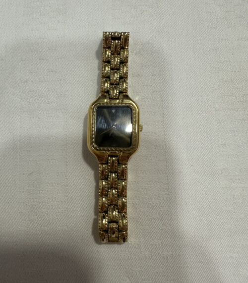 Elegante Vintage Bucherer Damenuhr mit schwarzem Zifferblatt und Goldarmband