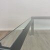 Moderner Glas-Couchtisch mit Metallgestell quadratisch