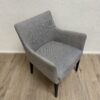 Moderner grauer Armlehnensessel mit Stoffbezug