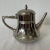 Teeservice aus Edelstahl mit Teekanne, Kaffeekanne und Zuckergefaess