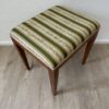 Vintage Polsterhocker mit grün geblümtem Stoffbezug