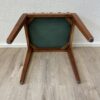 Vintage Polsterhocker mit grün geblümtem Stoffbezug