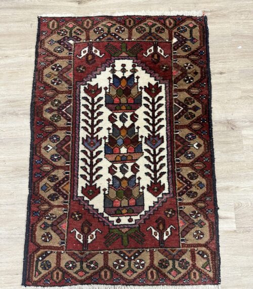 Vintage Orientteppich aus Wolle mit buntem Blumenmuster