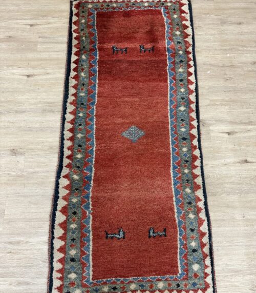 Vintage Orientteppich mit Tiermotiven in Rot