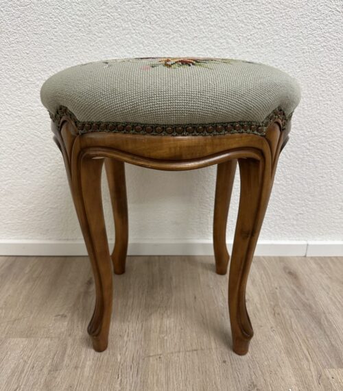 Vintage Polsterhocker mit floralem Stoffbezug rund