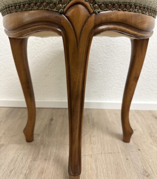 Vintage Polsterhocker mit floralem Stoffbezug rund