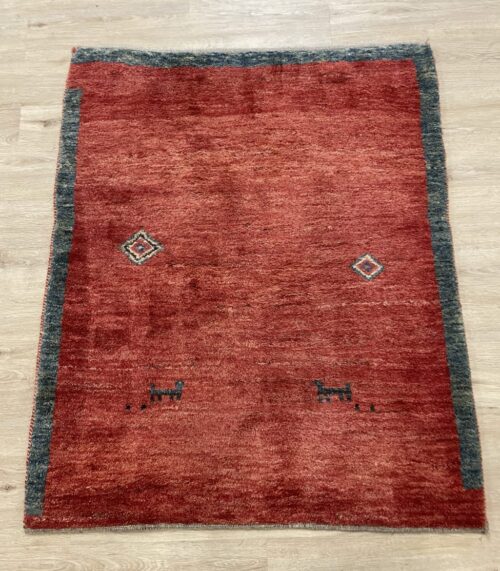 Vintage Orientteppich mit Tiermotiven in Rot und Blau