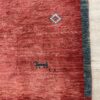 Vintage Orientteppich mit Tiermotiven in Rot und Blau