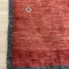 Vintage Orientteppich mit Tiermotiven in Rot und Blau