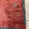 Vintage Orientteppich mit Tiermotiven in Rot und Blau