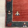 Vintage Orientteppich mit Kinderfiguren in Rot und Blau