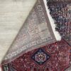 Vintage Orientteppich rot mit floralen Mustern aus Wolle