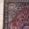 Vintage Orientteppich rot mit floralen Mustern aus Wolle