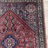Vintage Orientteppich rot mit floralen Mustern aus Wolle