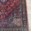 Vintage Orientteppich rot mit floralen Mustern aus Wolle
