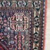 Vintage Orientteppich rot mit floralen Mustern aus Wolle