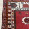 Vintage Orientteppich in Rot mit floralem Muster aus Wolle