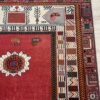 Vintage Orientteppich in Rot mit floralem Muster aus Wolle