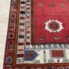 Vintage Orientteppich in Rot mit floralem Muster aus Wolle