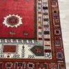 Vintage Orientteppich in Rot mit floralem Muster aus Wolle