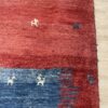 Vintage Wollteppich mit Figurenmotiv in Rot und Blau