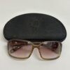 Vintage Sonnenbrille mit rosa Farbverlauf und Transparentrahmen