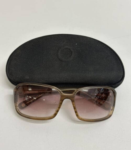 Vintage Sonnenbrille mit rosa Farbverlauf und Transparentrahmen