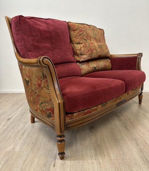 Vintage Zweisitzer Sofa mit floraler Polsterung und Holzrahmen