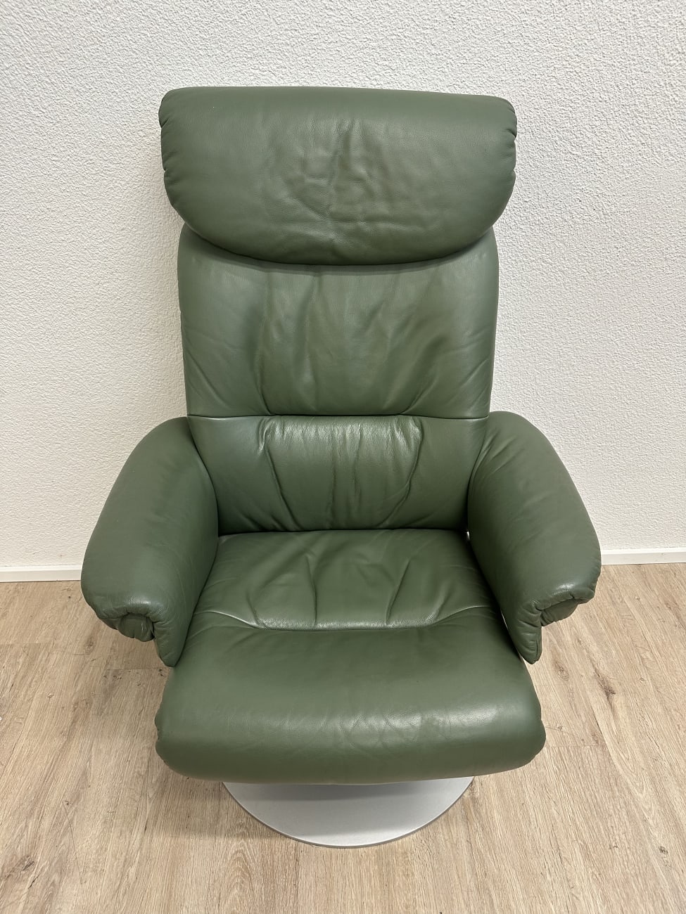 Vintage Drehsessel mit Ottoman in Dunkelgrün