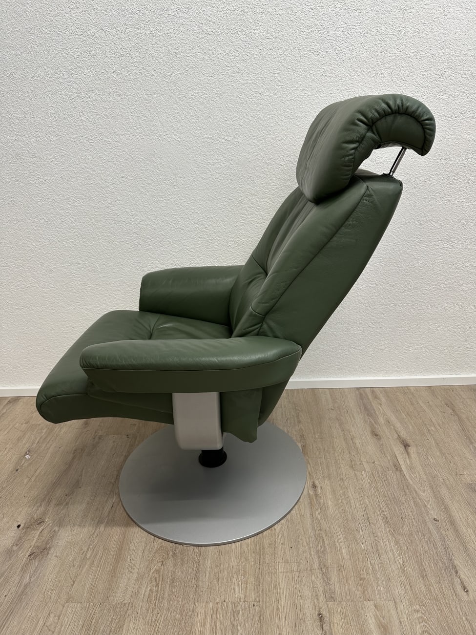 Vintage Drehsessel mit Ottoman in Dunkelgrün